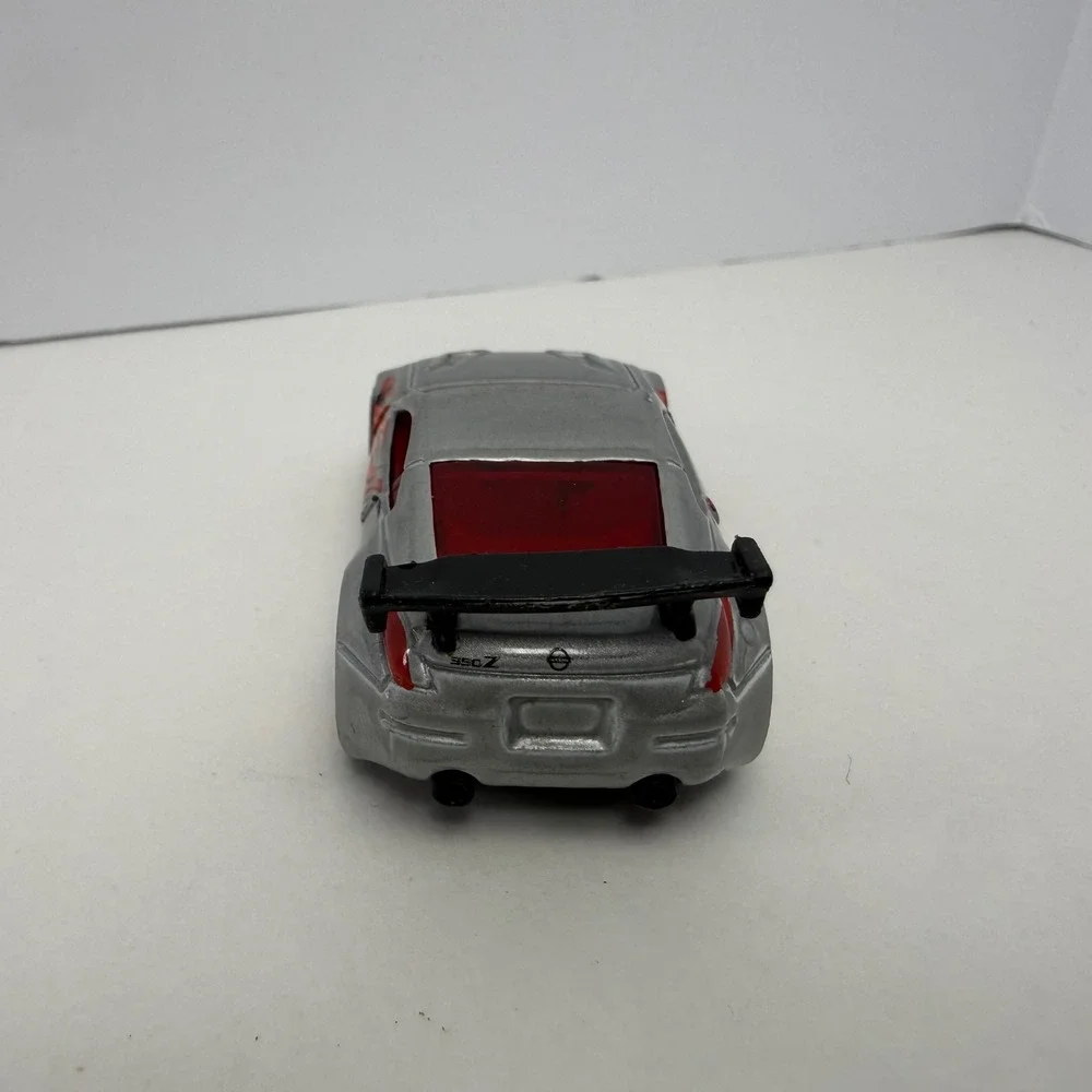 Hot Wheels Nissan 350Z Silver Flame Graphics Diecast Car 1/64 Scale 2006 E05